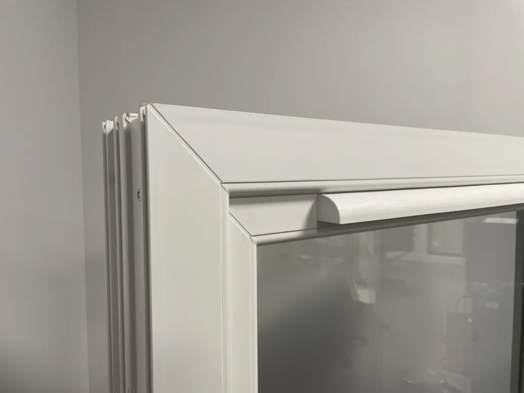 upvc sliding sash windows close up image of showcasing corner joints in standard.